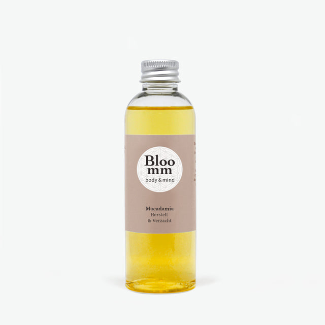 Huile naturelle de macadamia pour la peau, restaure et adoucit.