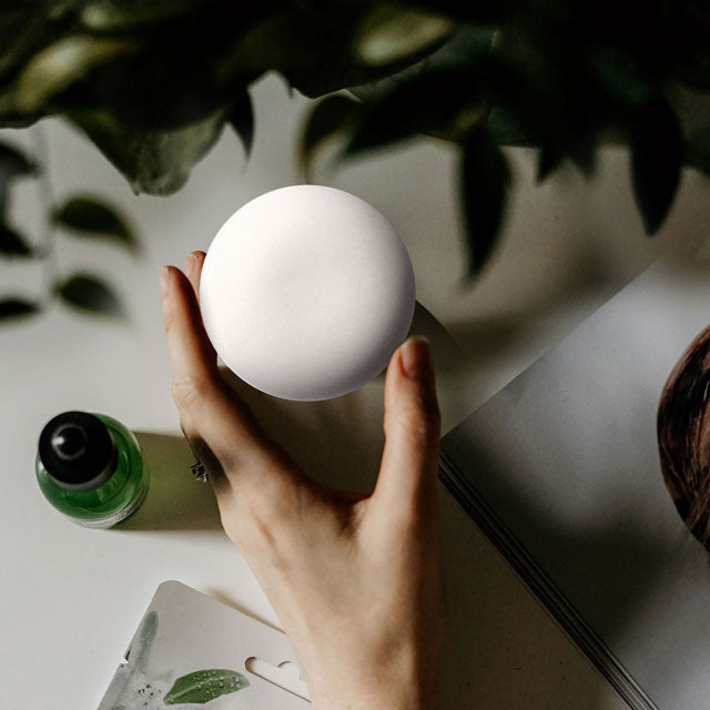 Pebble Wireless Aroma Diffuser with Sweet Essential Oil.